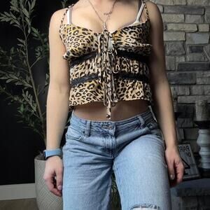 No boundaries leopard print cami with tie front and lace details